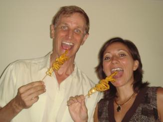 Eating squid on a stick