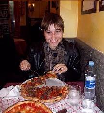 Vicki eating the best pizza in the world, in Naples